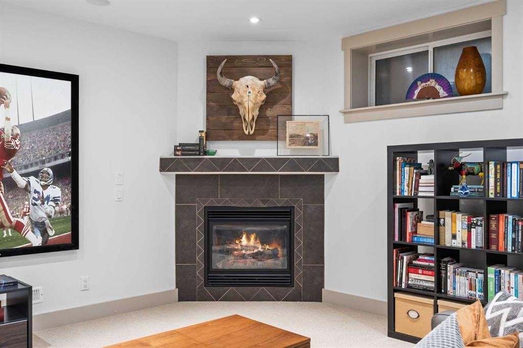 211 32 Avenue Nw, Calgary, AB - Indoor Photo Showing Living Room With Fireplace