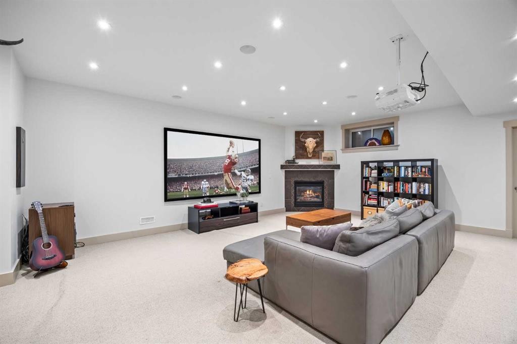211 32 Avenue Nw, Calgary, AB - Indoor Photo Showing Living Room With Fireplace