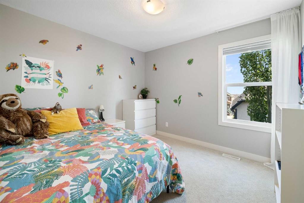 94 Masters Mews Se, Calgary, AB - Indoor Photo Showing Bedroom