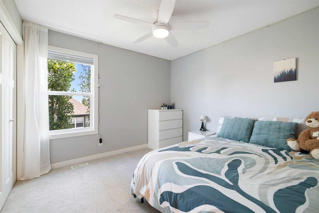 94 Masters Mews Se, Calgary, AB - Indoor Photo Showing Bedroom