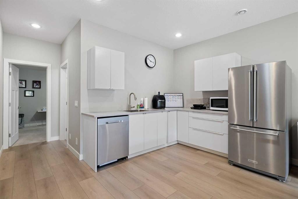 94 Masters Mews Se, Calgary, AB - Indoor Photo Showing Kitchen With Stainless Steel Kitchen