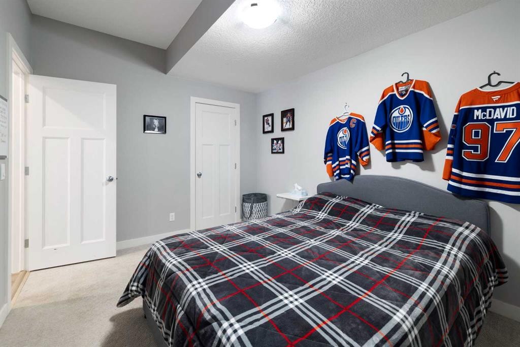 94 Masters Mews Se, Calgary, AB - Indoor Photo Showing Bedroom