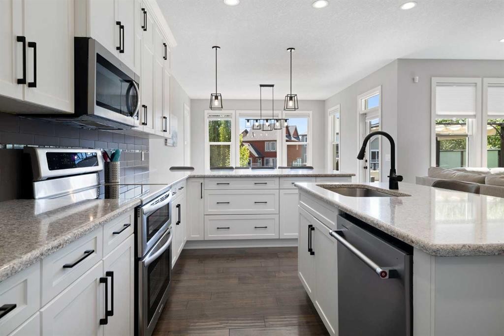 94 Masters Mews Se, Calgary, AB - Indoor Photo Showing Kitchen With Upgraded Kitchen