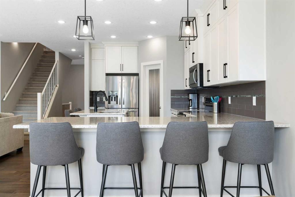 94 Masters Mews Se, Calgary, AB - Indoor Photo Showing Kitchen With Stainless Steel Kitchen With Upgraded Kitchen