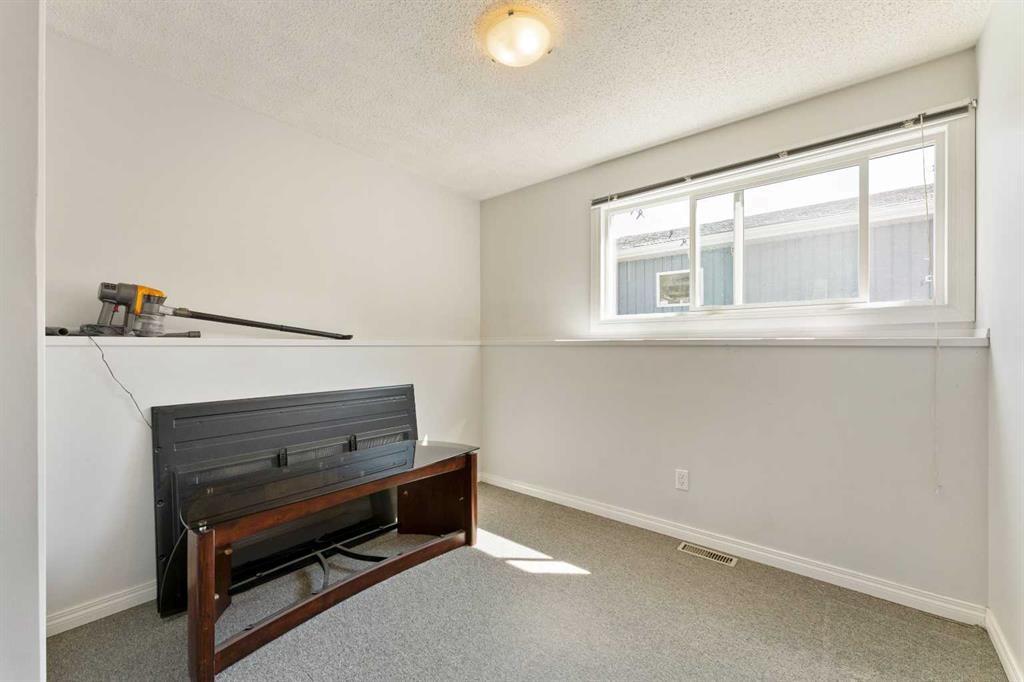 79 Templegreen Place Ne, Calgary, AB - Indoor Photo Showing Other Room