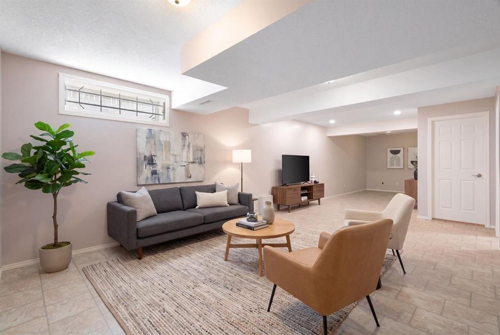 77 Tararidge Circle Ne, Calgary, AB - Indoor Photo Showing Living Room