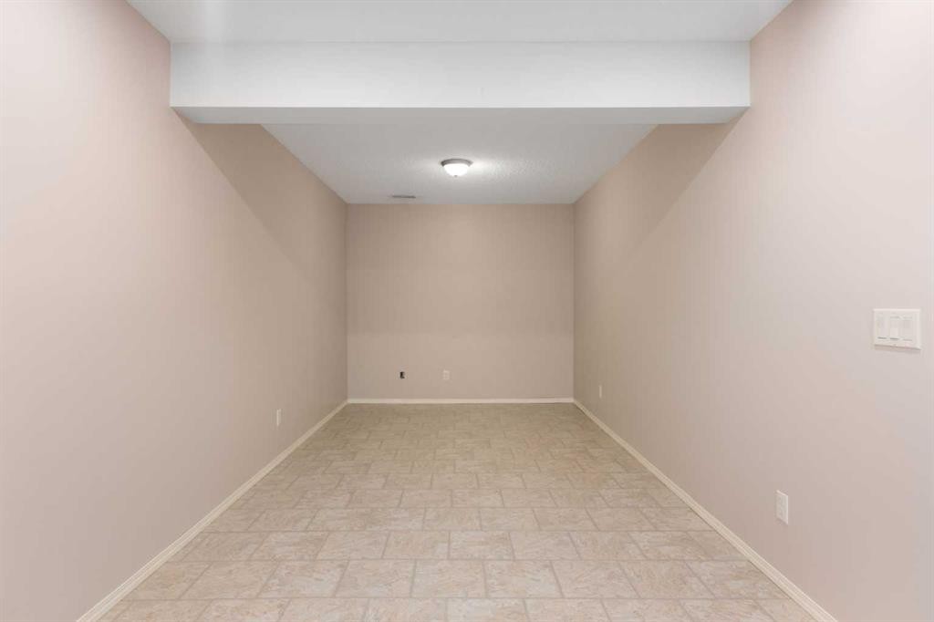 77 Tararidge Circle Ne, Calgary, AB - Indoor Photo Showing Other Room