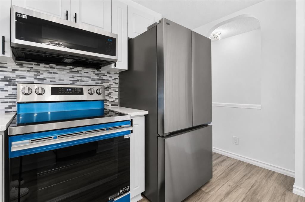 250 Bridlewood Circle Sw, Calgary, AB - Indoor Photo Showing Kitchen With Stainless Steel Kitchen