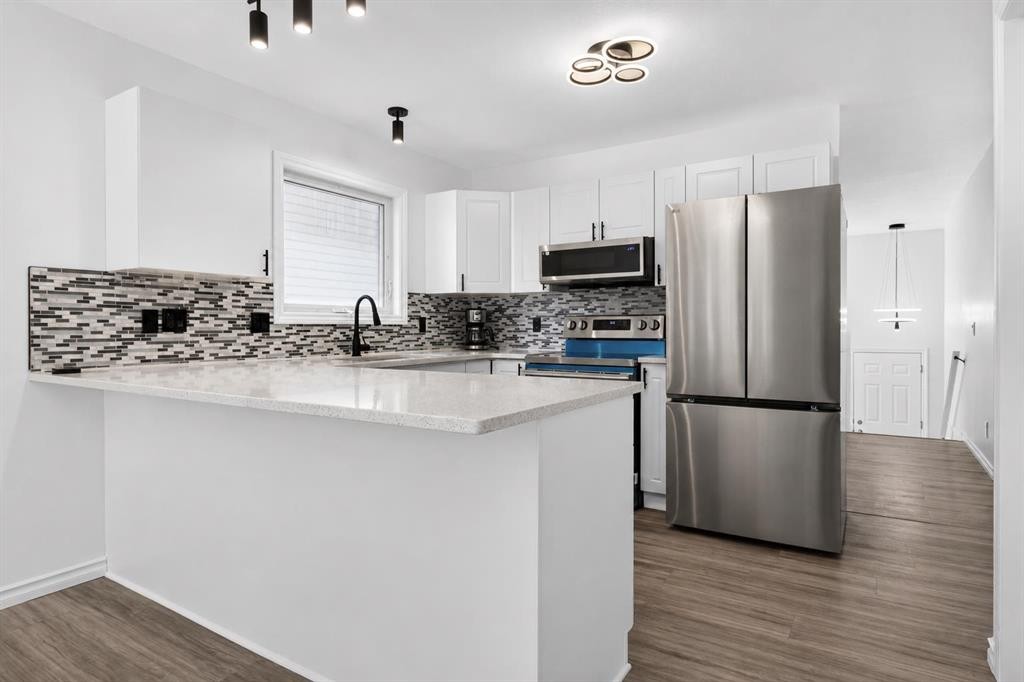 250 Bridlewood Circle Sw, Calgary, AB - Indoor Photo Showing Kitchen With Stainless Steel Kitchen With Upgraded Kitchen