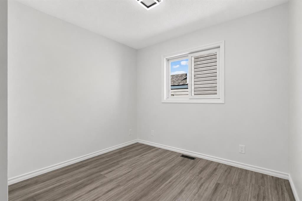 250 Bridlewood Circle Sw, Calgary, AB - Indoor Photo Showing Other Room