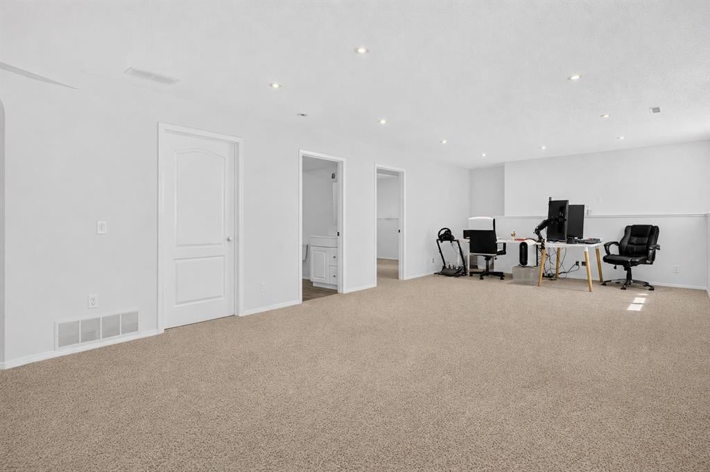 250 Bridlewood Circle Sw, Calgary, AB - Indoor Photo Showing Other Room