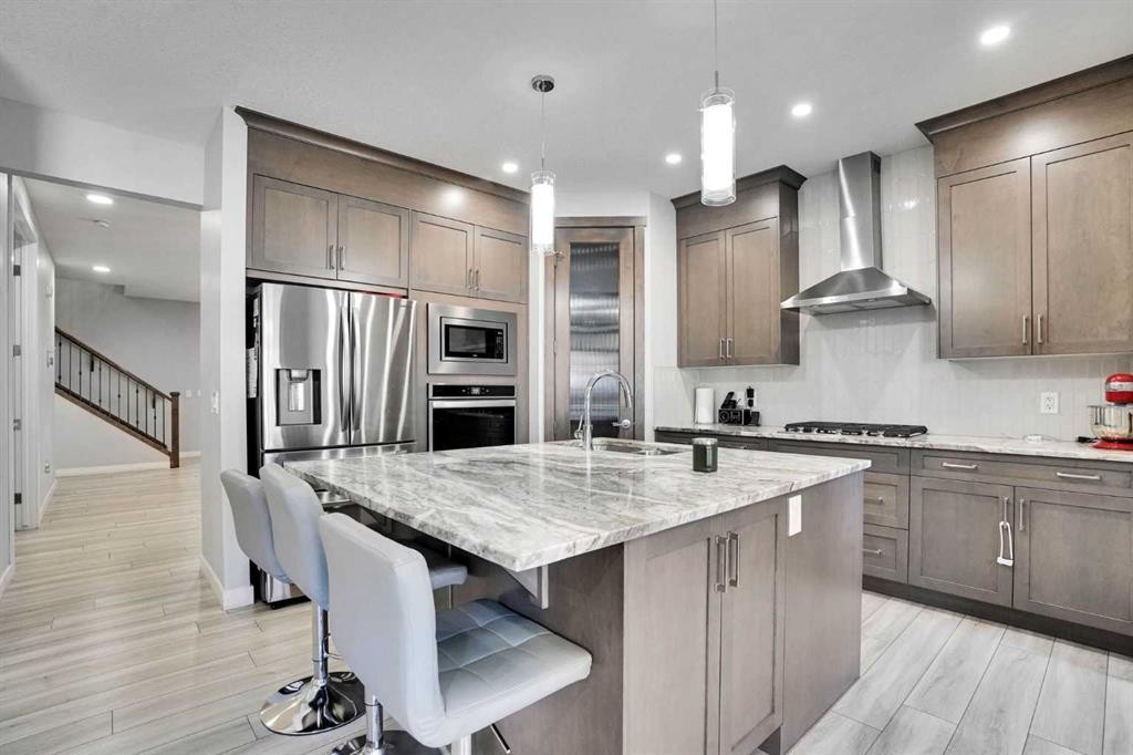 50 Saddlestone Place Ne, Calgary, AB - Indoor Photo Showing Kitchen With Stainless Steel Kitchen With Upgraded Kitchen