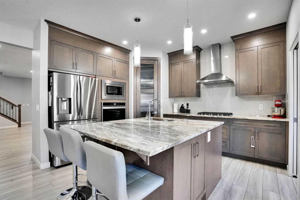 50 Saddlestone Place Ne, Calgary, AB - Indoor Photo Showing Kitchen With Stainless Steel Kitchen With Upgraded Kitchen