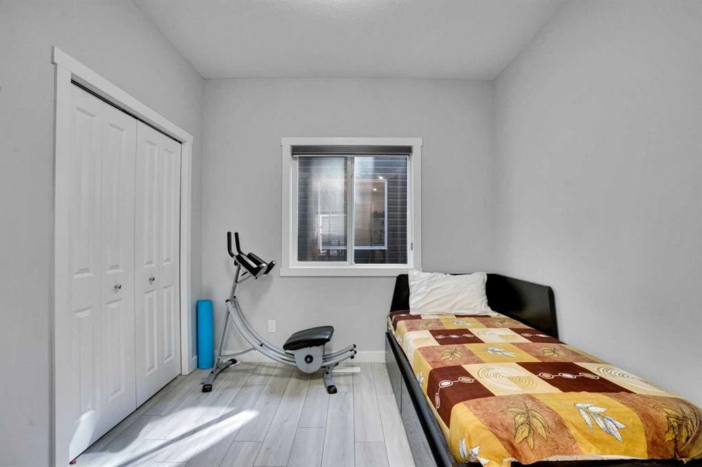 50 Saddlestone Place Ne, Calgary, AB - Indoor Photo Showing Bedroom