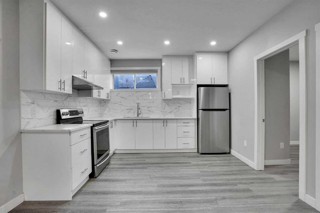 50 Saddlestone Place Ne, Calgary, AB - Indoor Photo Showing Kitchen With Stainless Steel Kitchen With Upgraded Kitchen