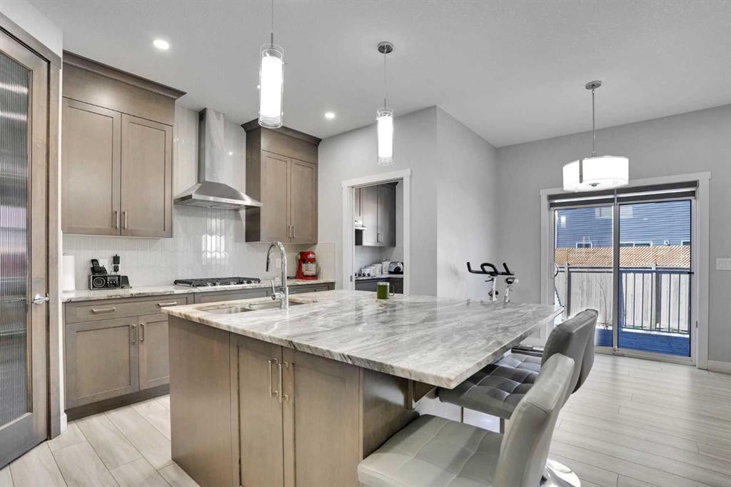50 Saddlestone Place Ne, Calgary, AB - Indoor Photo Showing Kitchen With Double Sink With Upgraded Kitchen