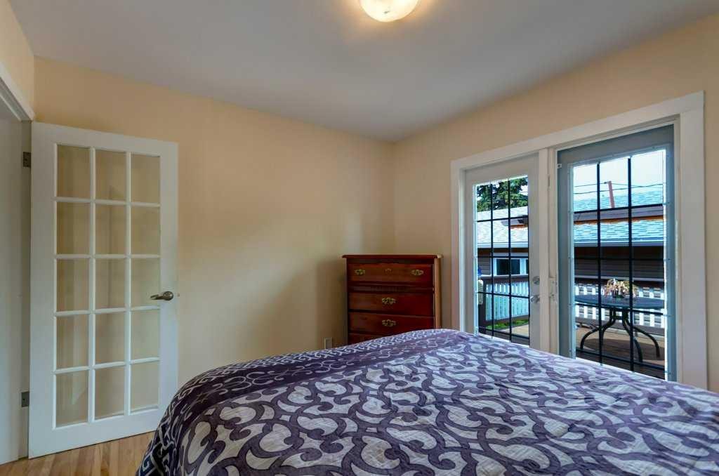 48 Hillary Crescent Sw, Calgary, AB - Indoor Photo Showing Bedroom