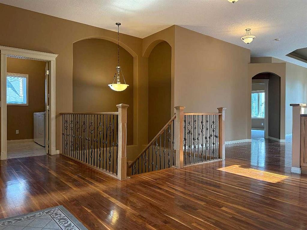 157 Valley Creek Place Nw, Calgary, AB - Indoor Photo Showing Other Room With Fireplace