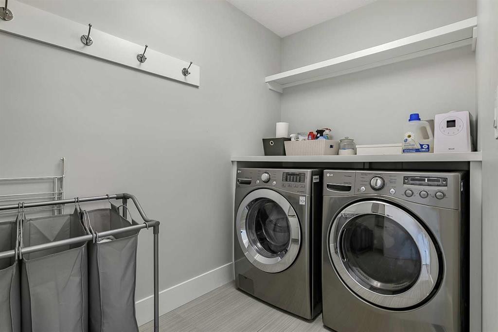 5013 23 Avenue Nw, Calgary, AB - Indoor Photo Showing Laundry Room