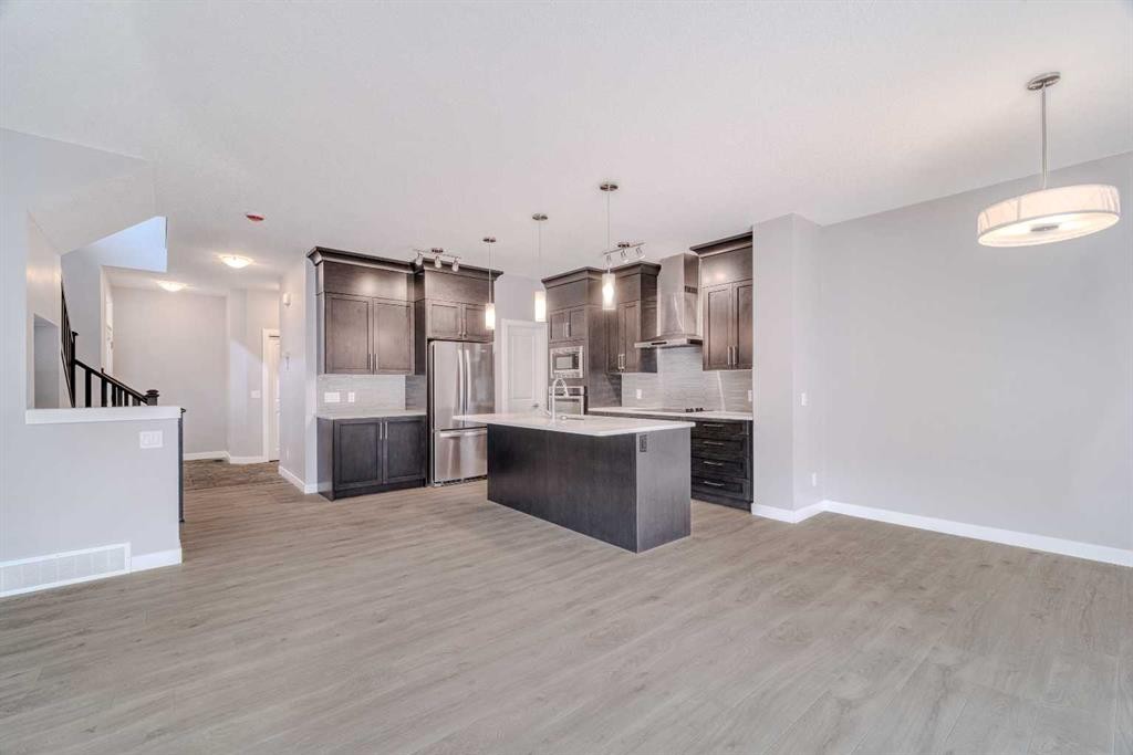 22 Sage Bluff Heights Nw, Calgary, AB - Indoor Photo Showing Kitchen With Upgraded Kitchen