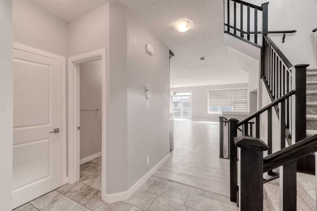 22 Sage Bluff Heights Nw, Calgary, AB - Indoor Photo Showing Other Room
