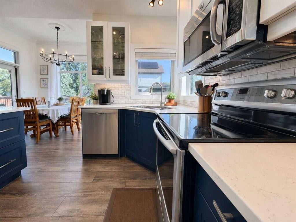 24 Brander Avenue Nw, Langdon, AB - Indoor Photo Showing Kitchen With Stainless Steel Kitchen With Upgraded Kitchen