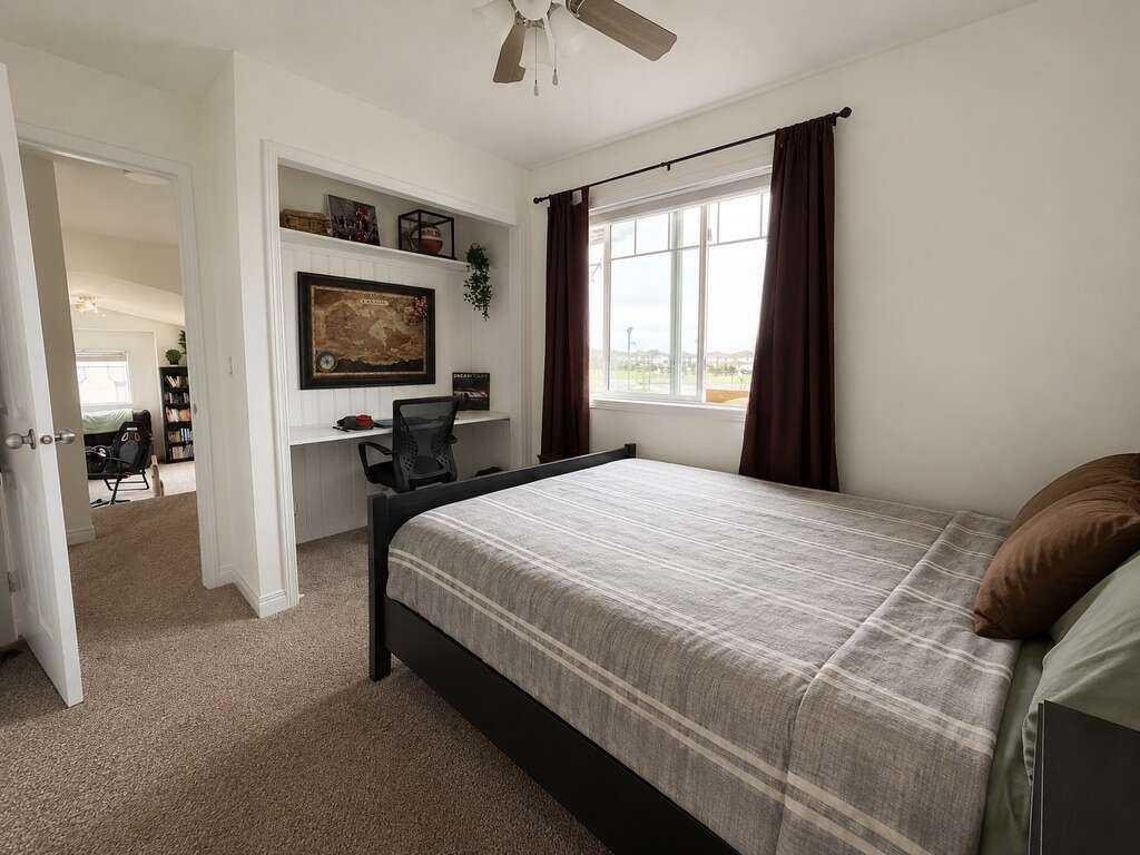 24 Brander Avenue Nw, Langdon, AB - Indoor Photo Showing Bedroom