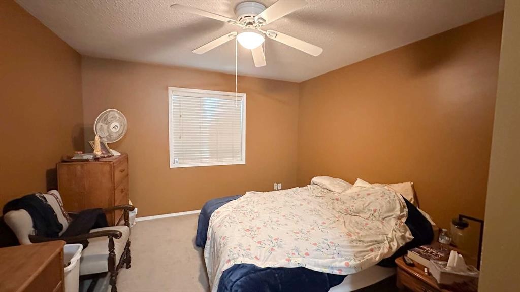 407 1 Avenue Nw, Sundre, AB - Indoor Photo Showing Bedroom