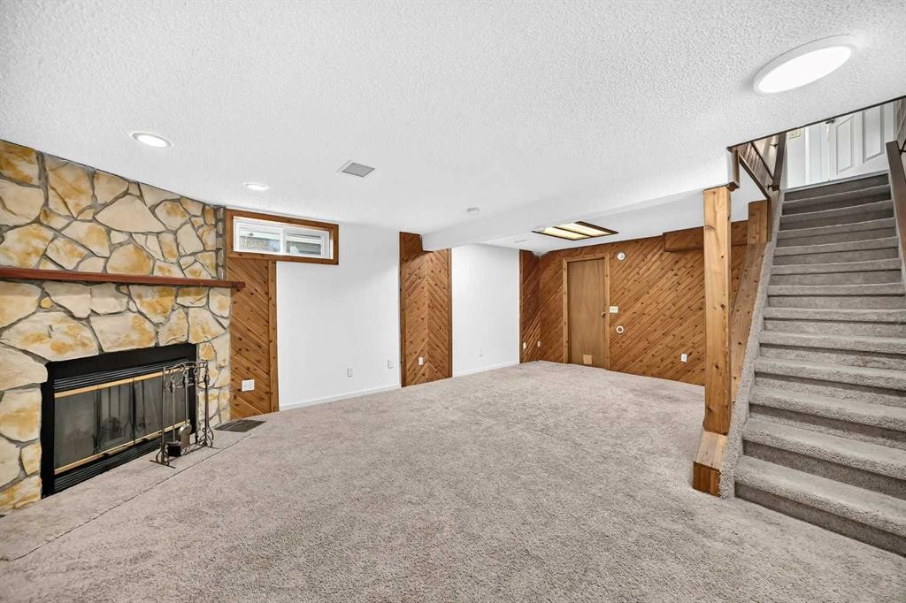 291 Falton Drive Ne, Calgary, AB - Indoor With Fireplace