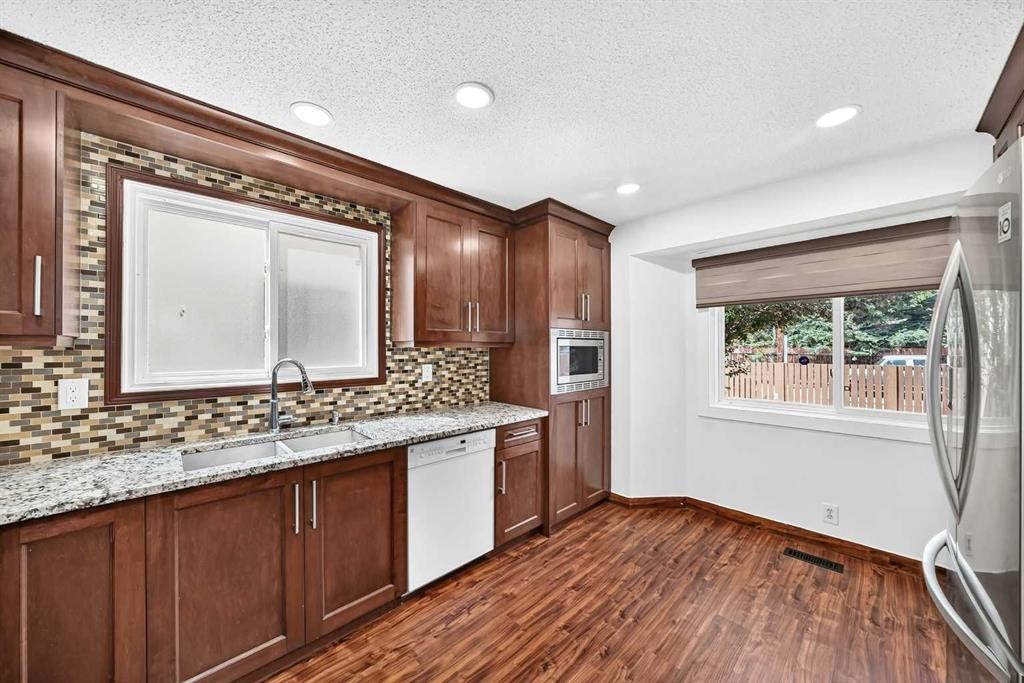 291 Falton Drive Ne, Calgary, AB - Indoor Photo Showing Kitchen With Double Sink