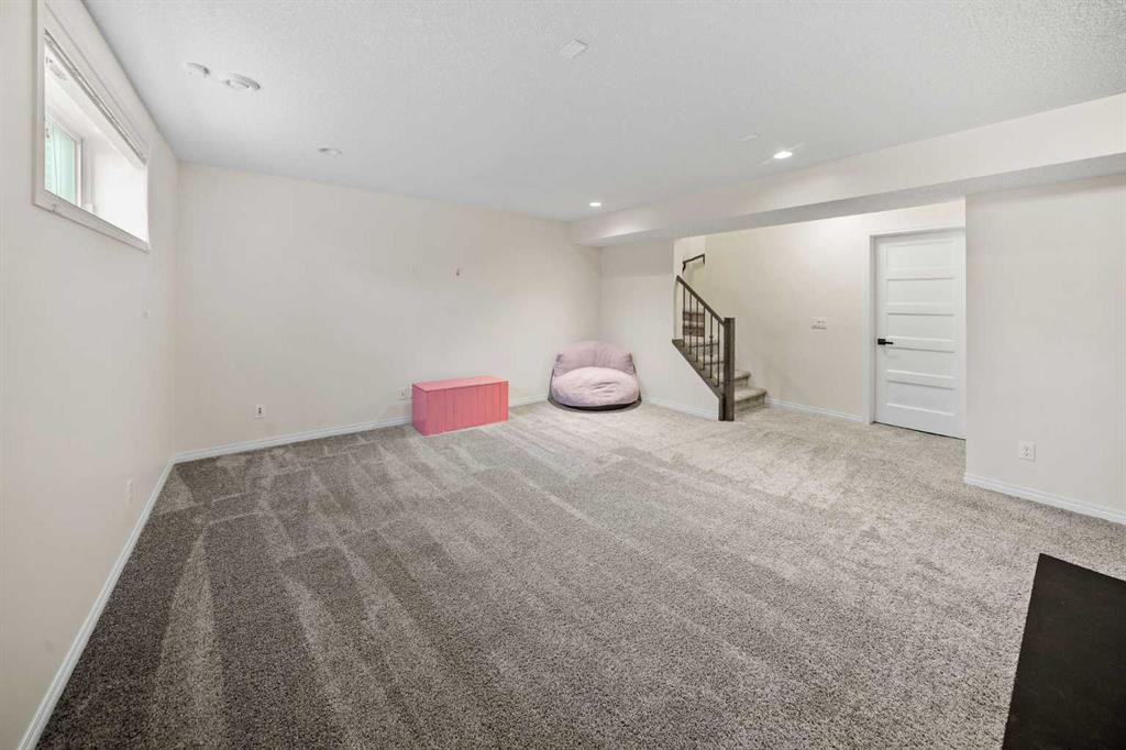 110 Kinniburgh Road, Chestermere, AB - Indoor Photo Showing Other Room