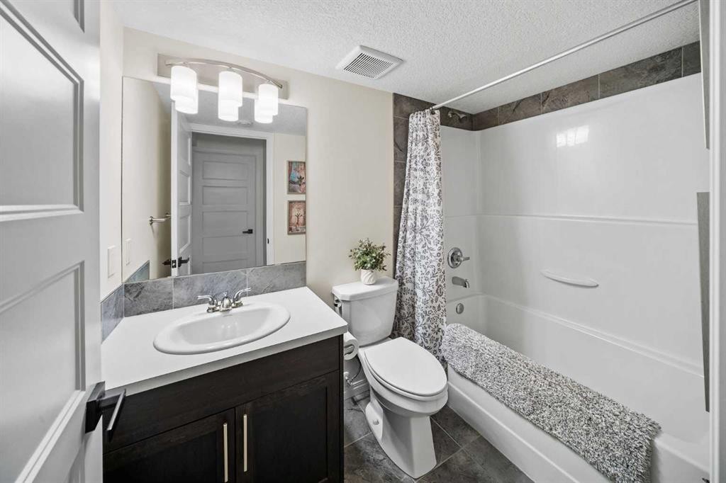 110 Kinniburgh Road, Chestermere, AB - Indoor Photo Showing Bathroom