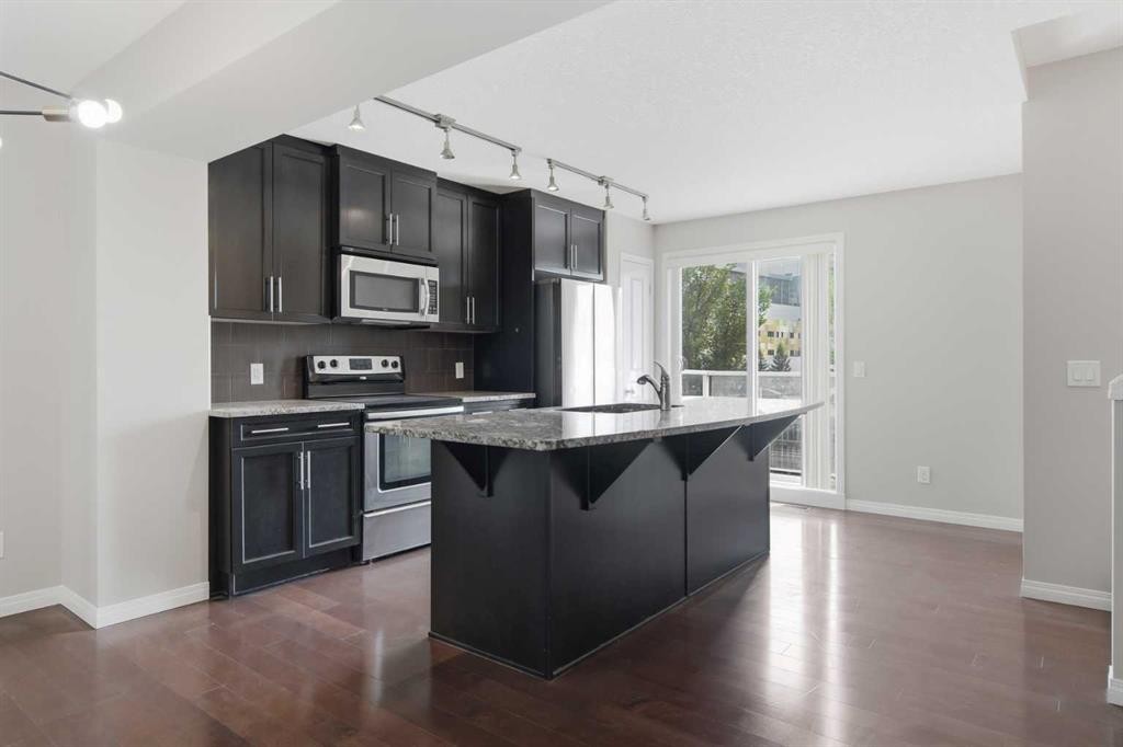 1404 Auburn Bay Square, Calgary, AB - Indoor Photo Showing Kitchen With Upgraded Kitchen