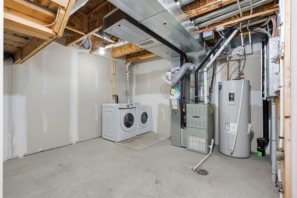 1404 Auburn Bay Square, Calgary, AB - Indoor Photo Showing Laundry Room
