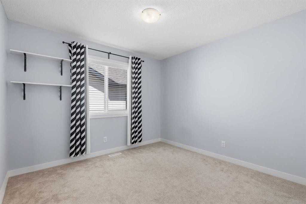 82 Brightonwoods Green Se, Calgary, AB - Indoor Photo Showing Other Room