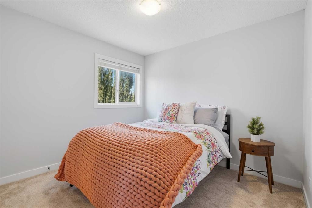82 Brightonwoods Green Se, Calgary, AB - Indoor Photo Showing Bedroom