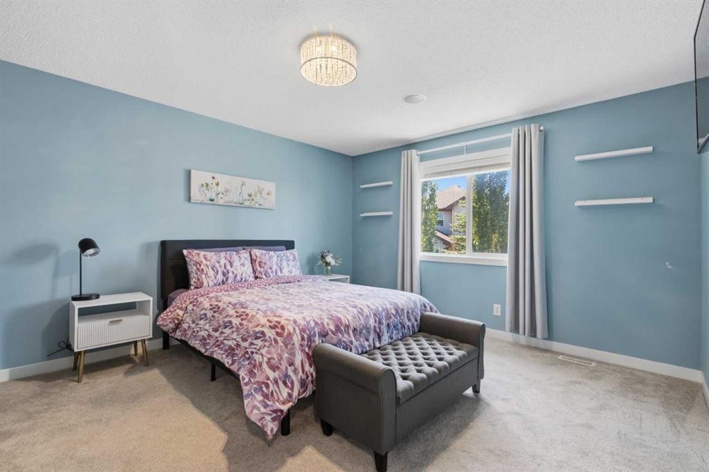 82 Brightonwoods Green Se, Calgary, AB - Indoor Photo Showing Bedroom