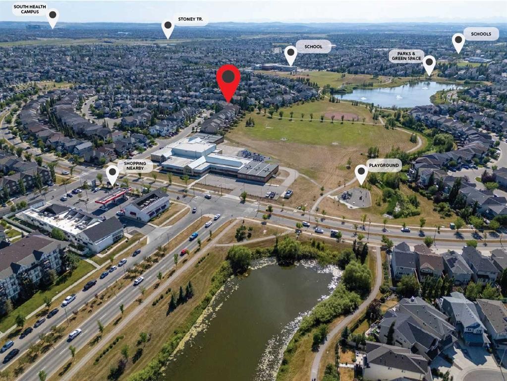 82 Brightonwoods Green Se, Calgary, AB - Outdoor With Body Of Water With View