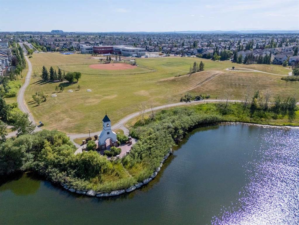 82 Brightonwoods Green Se, Calgary, AB - Outdoor With Body Of Water With View