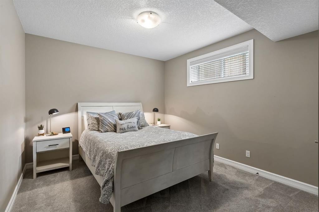 46 Aspenshire Place Sw, Calgary, AB - Indoor Photo Showing Bedroom