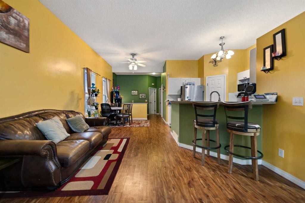 5036 Martin Crossing Drive Ne, Calgary, AB - Indoor Photo Showing Living Room