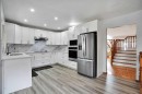 16 Sun Harbour Crescent Se, Calgary, AB  - Indoor Photo Showing Kitchen With Stainless Steel Kitchen 