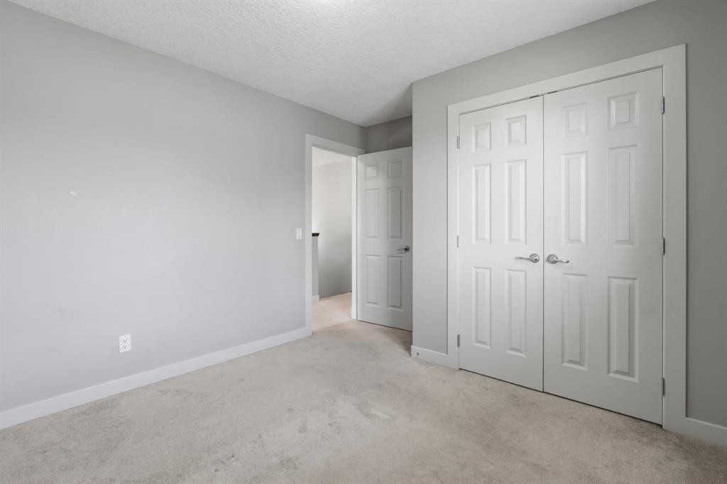 7 Copperleaf Terrace Se, Calgary, AB - Indoor Photo Showing Other Room