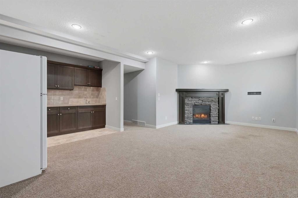 7 Copperleaf Terrace Se, Calgary, AB - Indoor With Fireplace