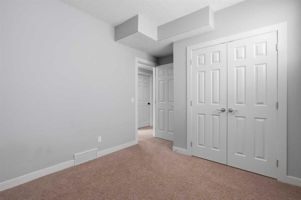 7 Copperleaf Terrace Se, Calgary, AB - Indoor Photo Showing Other Room
