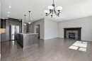 7 Copperleaf Terrace Se, Calgary, AB  - Indoor With Fireplace 