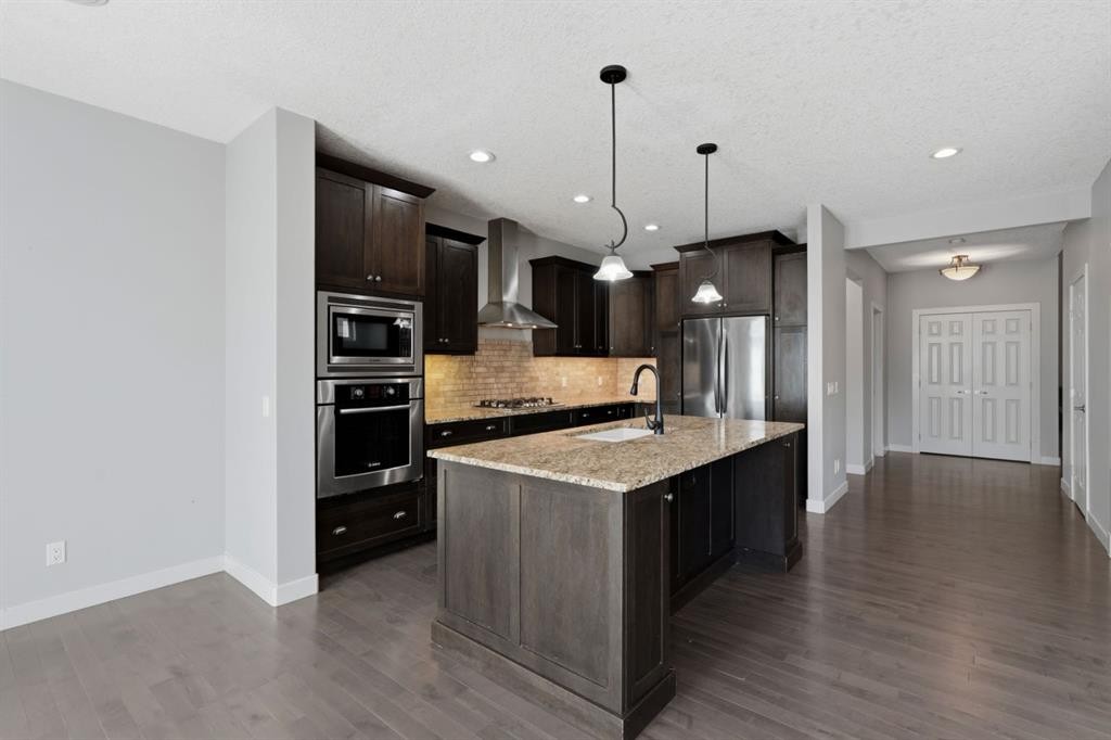 7 Copperleaf Terrace Se, Calgary, AB - Indoor Photo Showing Kitchen With Stainless Steel Kitchen With Upgraded Kitchen