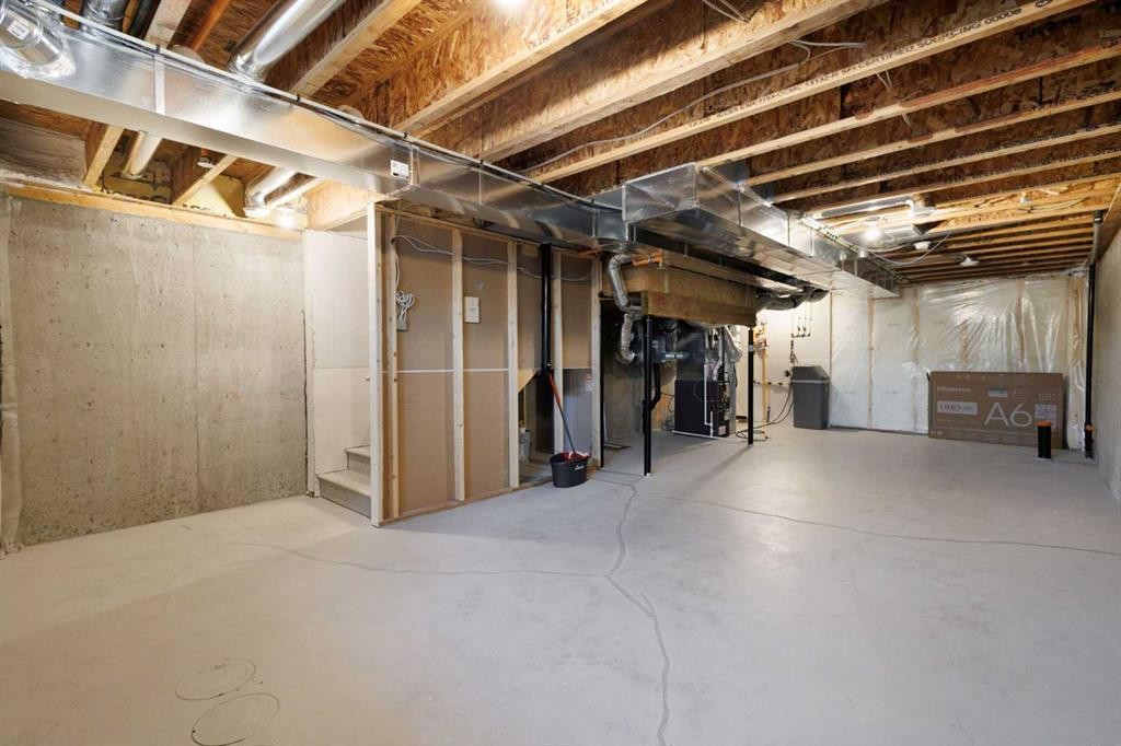 251 Lucas Boulevard Nw, Calgary, AB - Indoor Photo Showing Basement