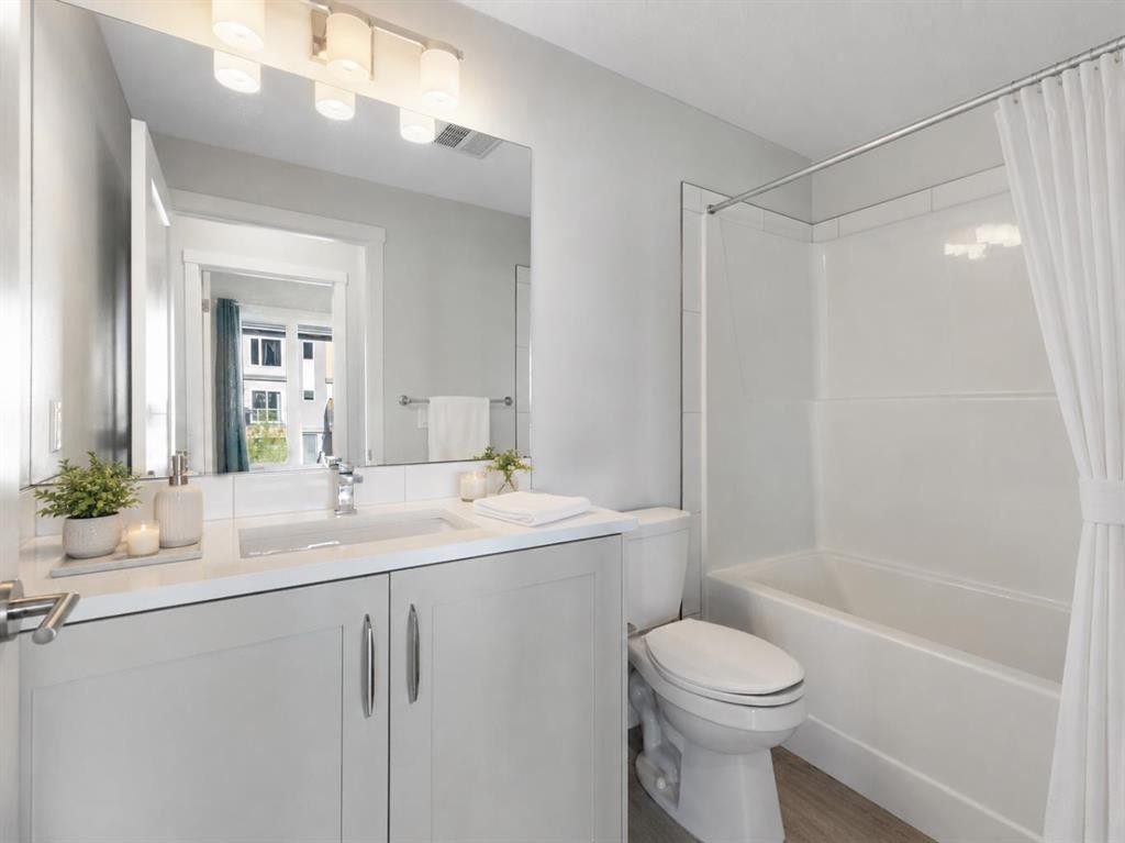 202-150 Shawnee Square Sw, Calgary, AB - Indoor Photo Showing Bathroom