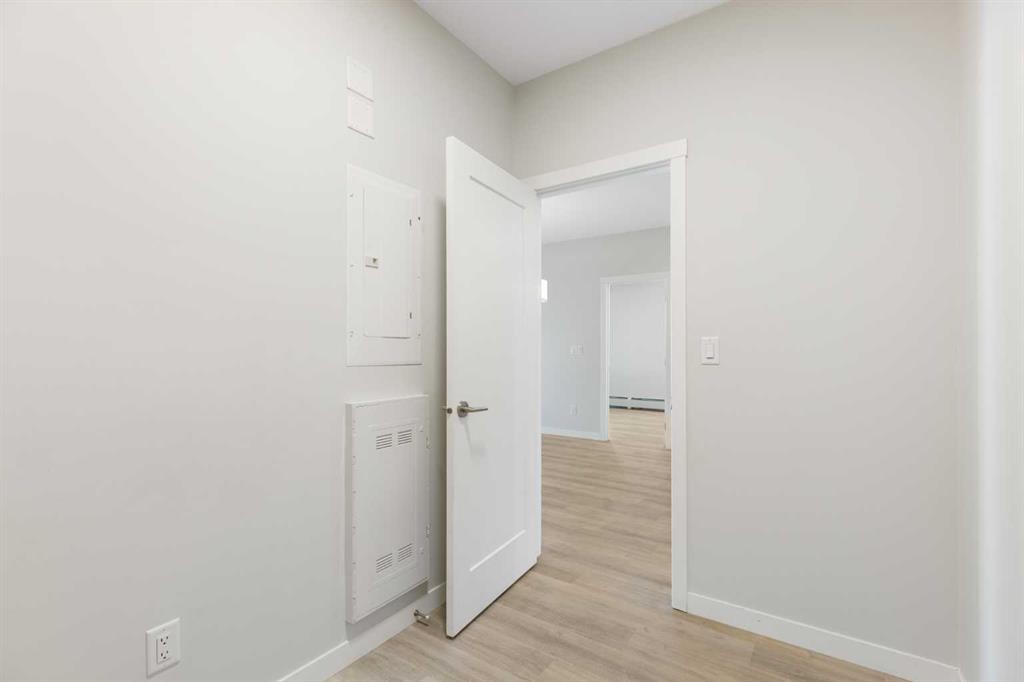 202-150 Shawnee Square Sw, Calgary, AB - Indoor Photo Showing Other Room